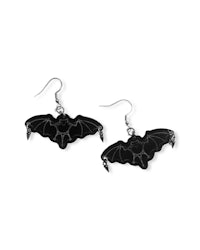 a pair of black bat earrings on a white background