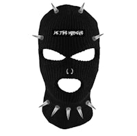 a black ski mask with spikes on it