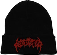 a black beanie with a red logo on it