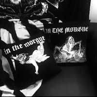 a black and white pillow with the words in the morgue on it